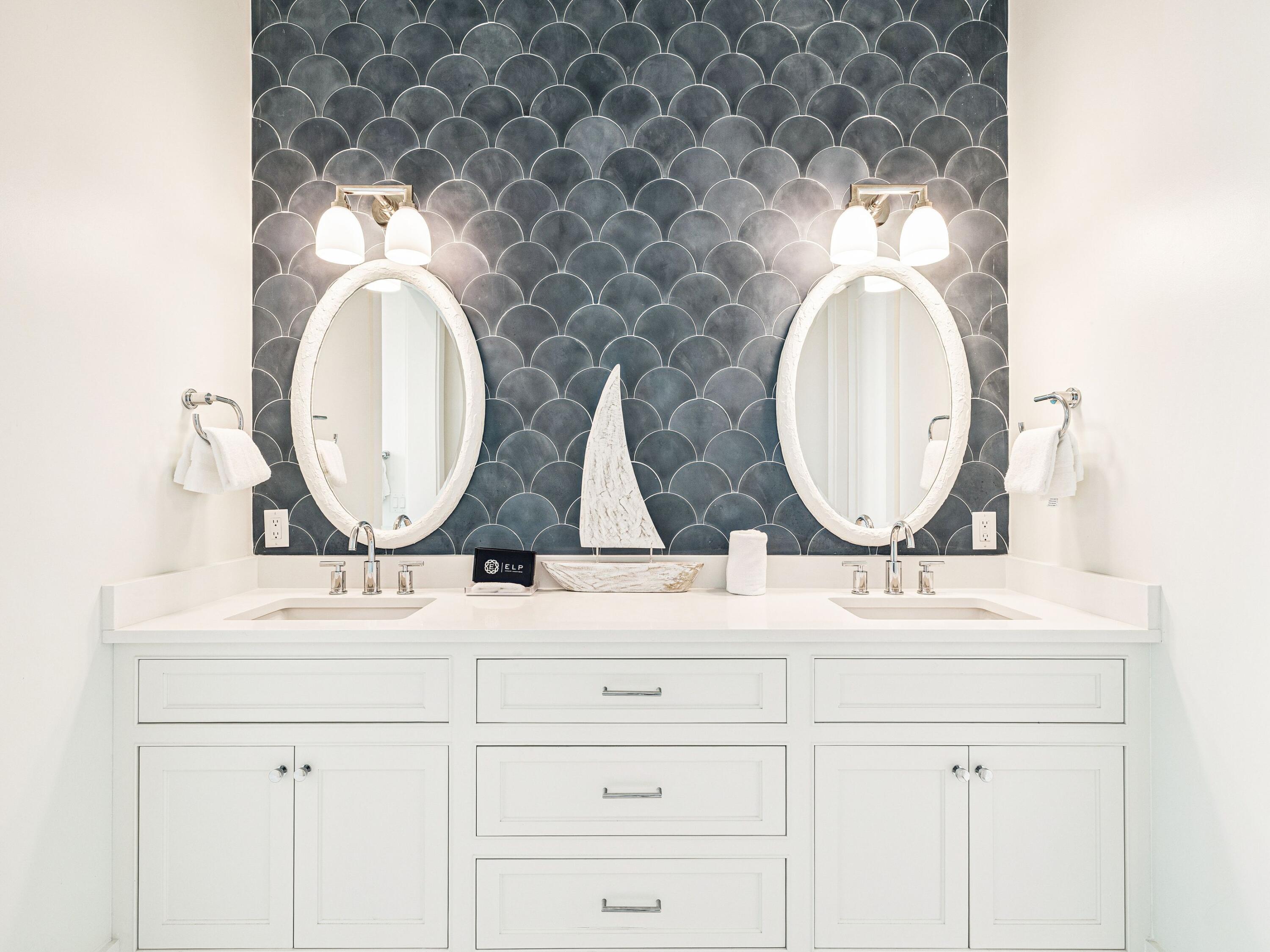 91 Emerald Cove Lane North Inlet Beach, FL 32461 - Photo 33 of 53 a bathroom with a double vanity sink mirror and