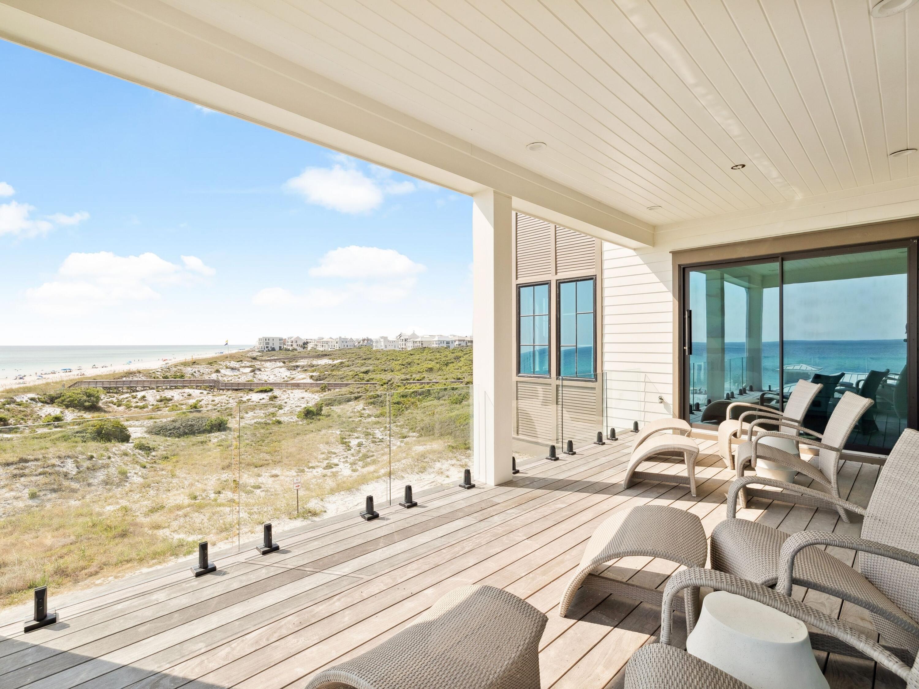 91 Emerald Cove Lane North Inlet Beach, FL 32461 - Photo 53 of 53 a bedroom with furniture and large windows