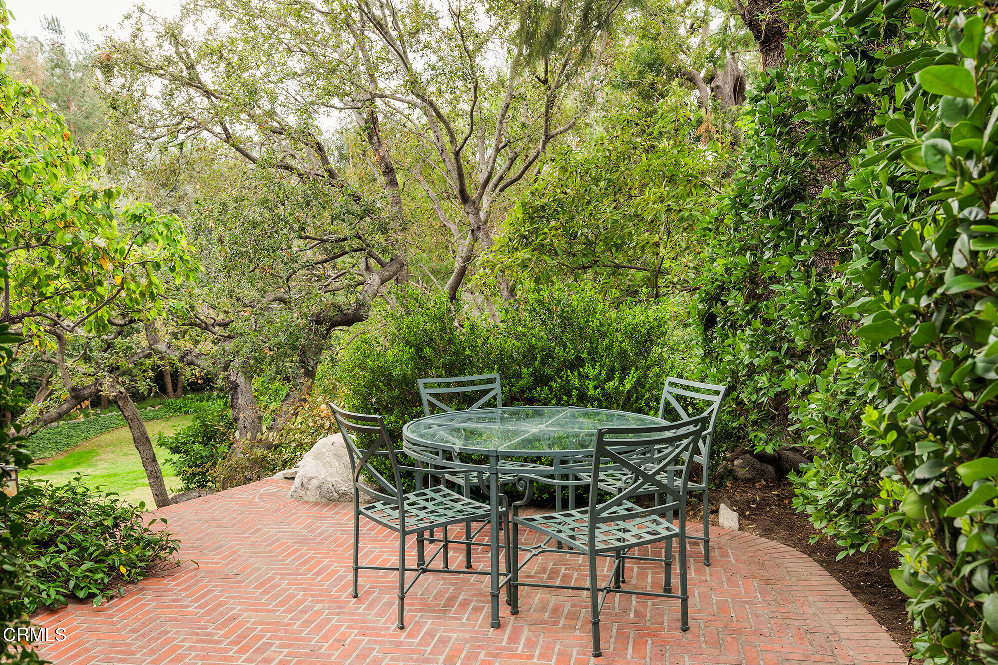 455 La Loma Road Pasadena, CA 91105 - Photo 11 of 21 a patio with table and chairs and potted plants
