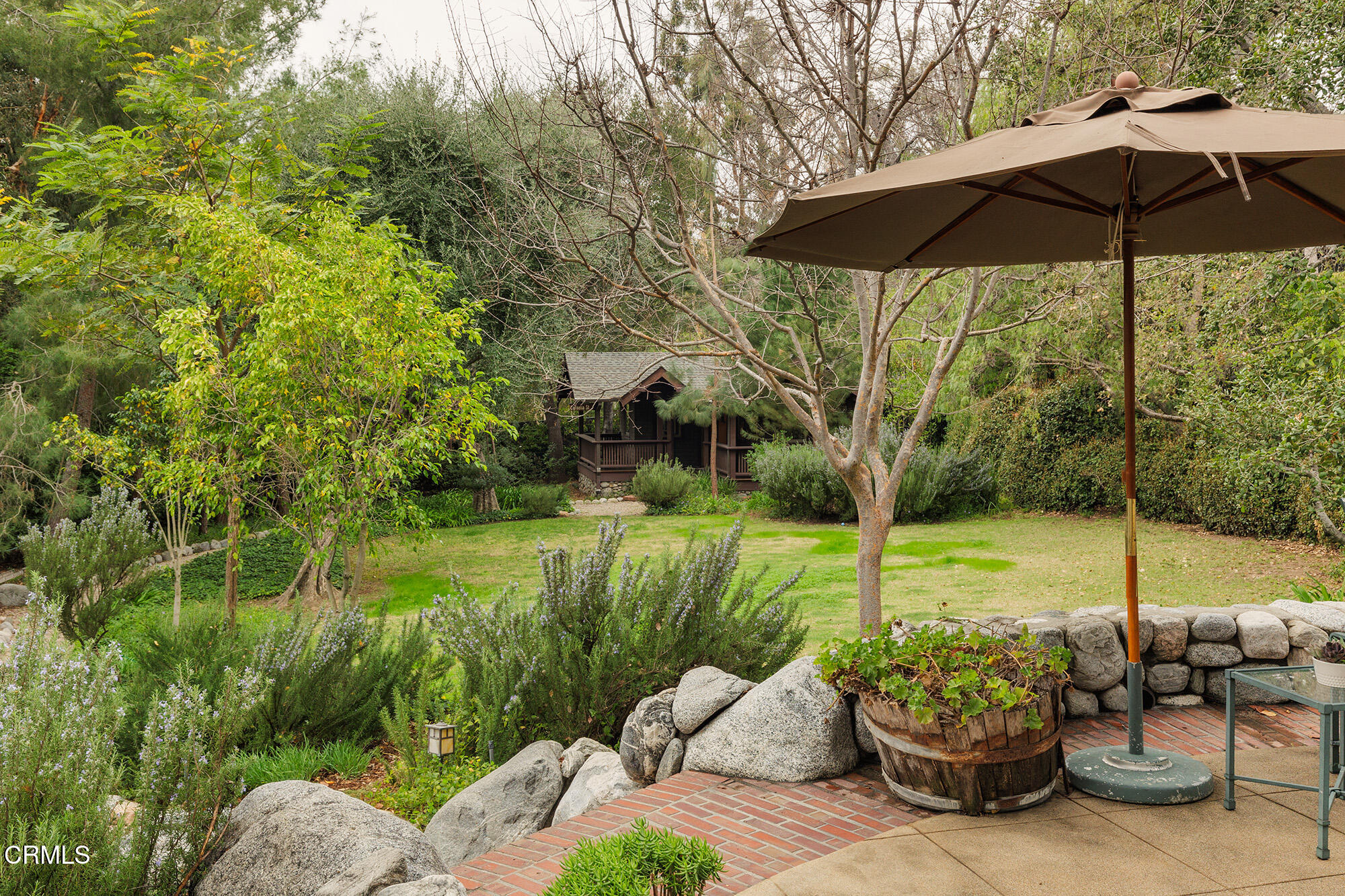 455 La Loma Road Pasadena, CA 91105 - Photo 14 of 21 a view of a garden with a patio