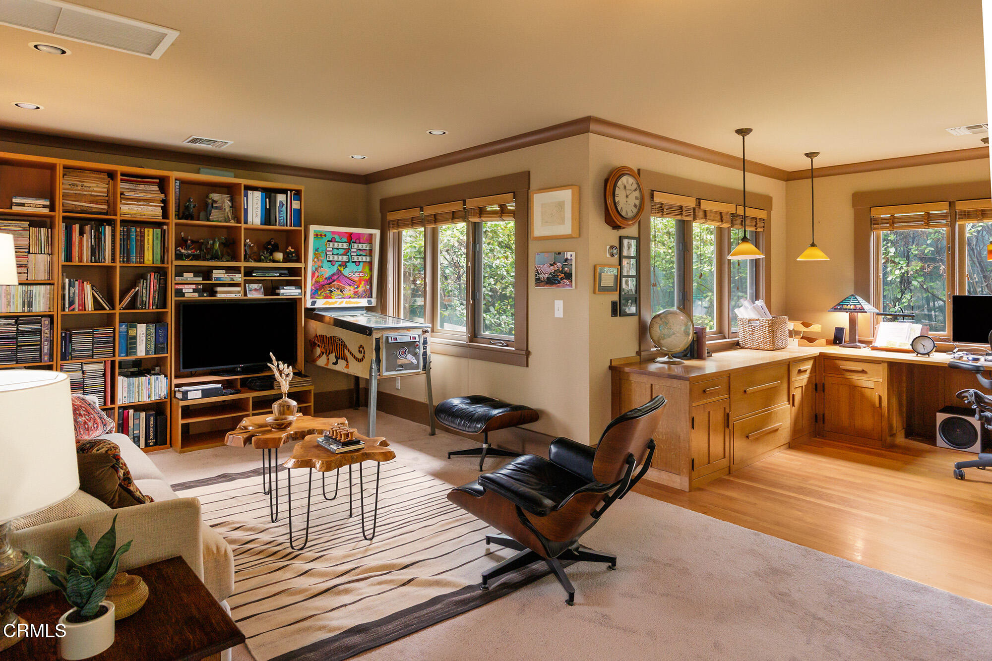 455 La Loma Road Pasadena, CA 91105 - Photo 16 of 21 a living room with furniture a flat screen tv and a floor to ceiling window