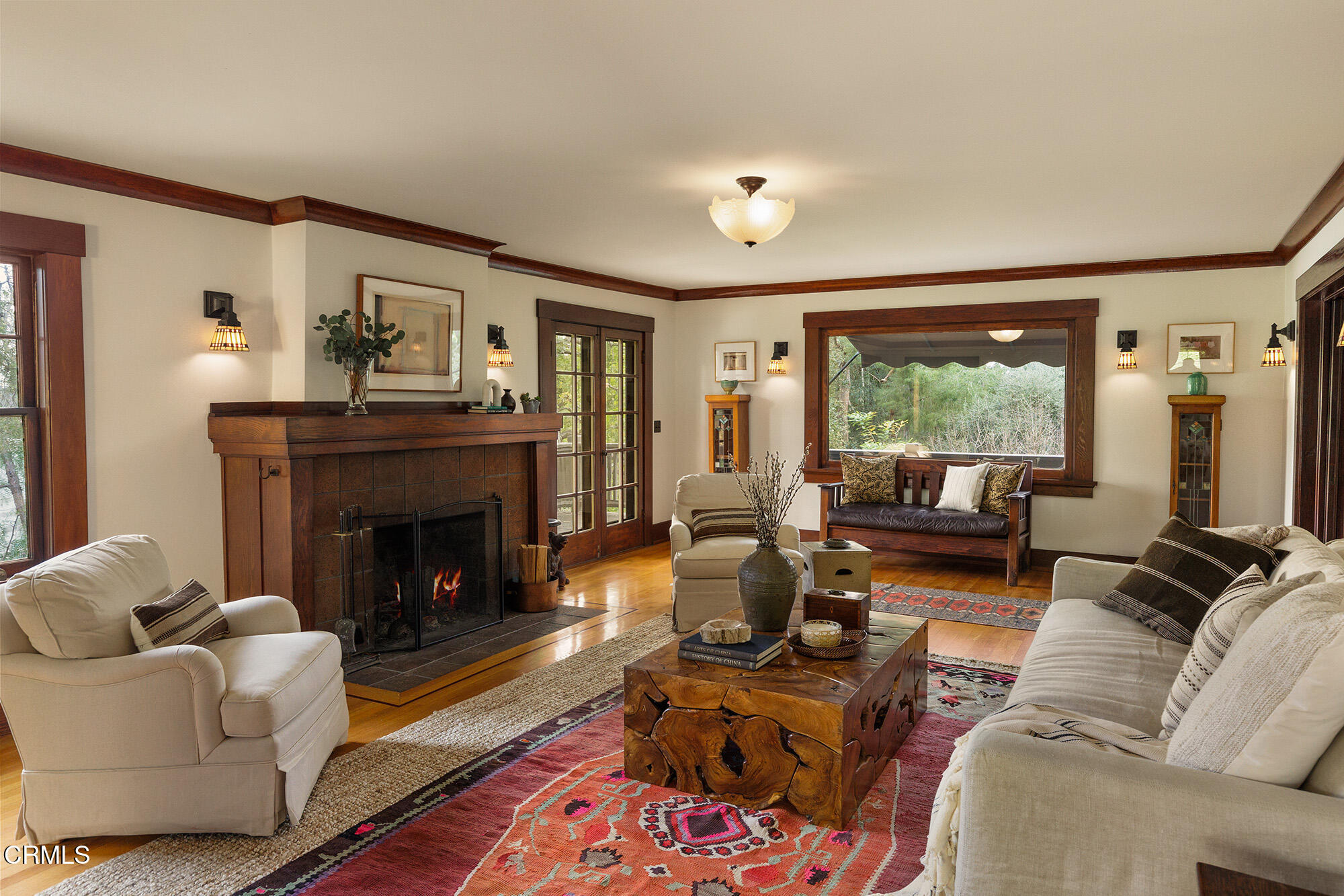 455 La Loma Road Pasadena, CA 91105 - Photo 4 of 21 a living room with furniture and a fireplace