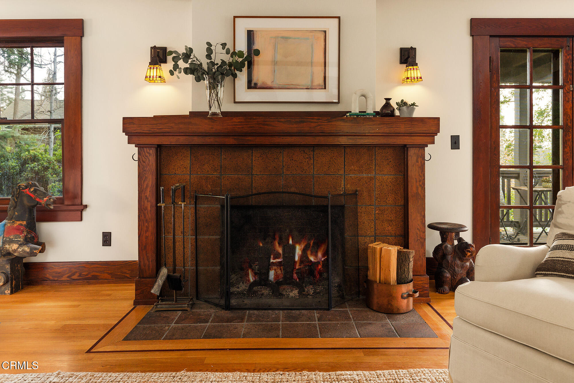455 La Loma Road Pasadena, CA 91105 - Photo 5 of 21 a living room with furniture and a fireplace