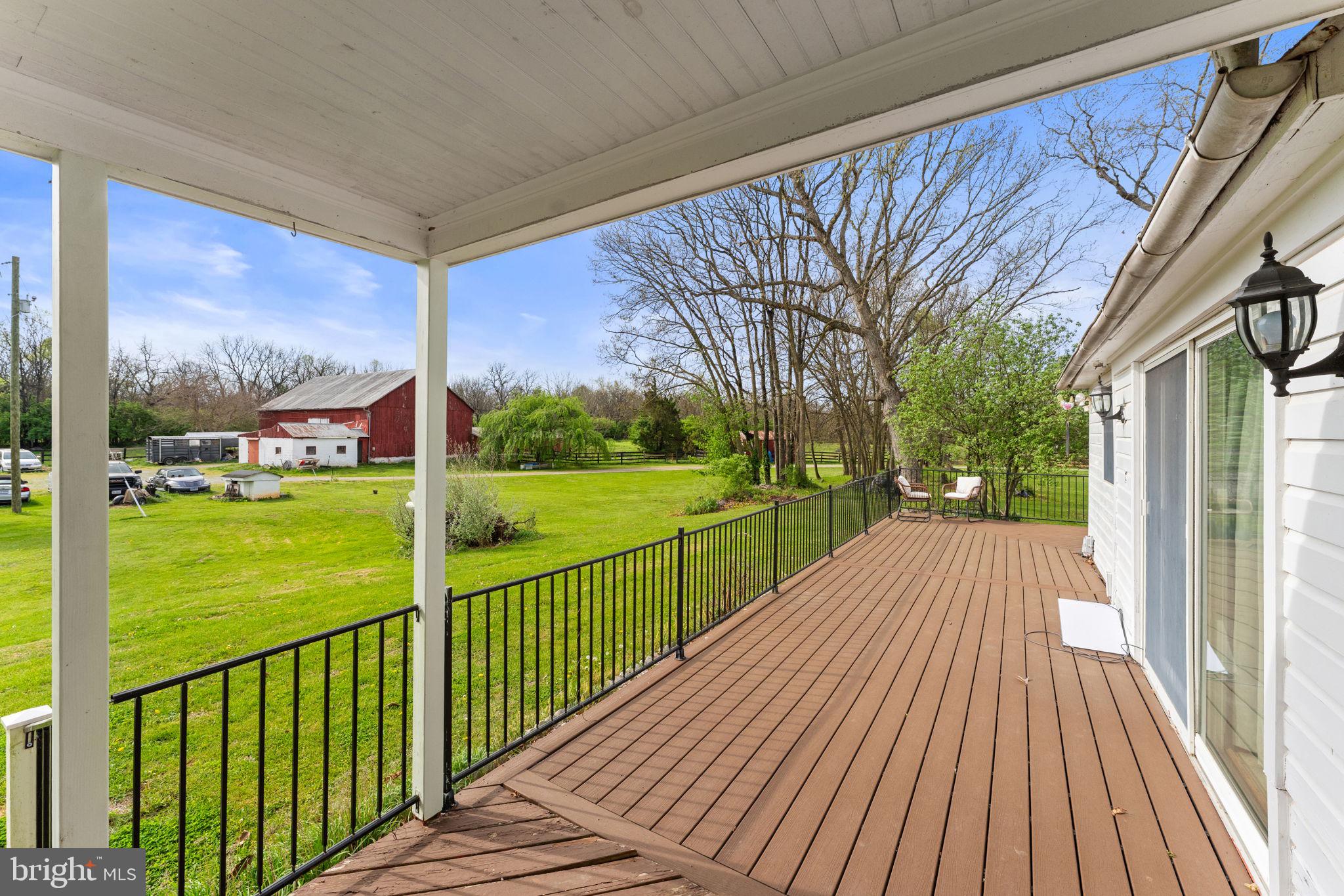 420 Russell Road Berryville, VA 22611 - Photo 43 of 60 Serene deck with lush green views.