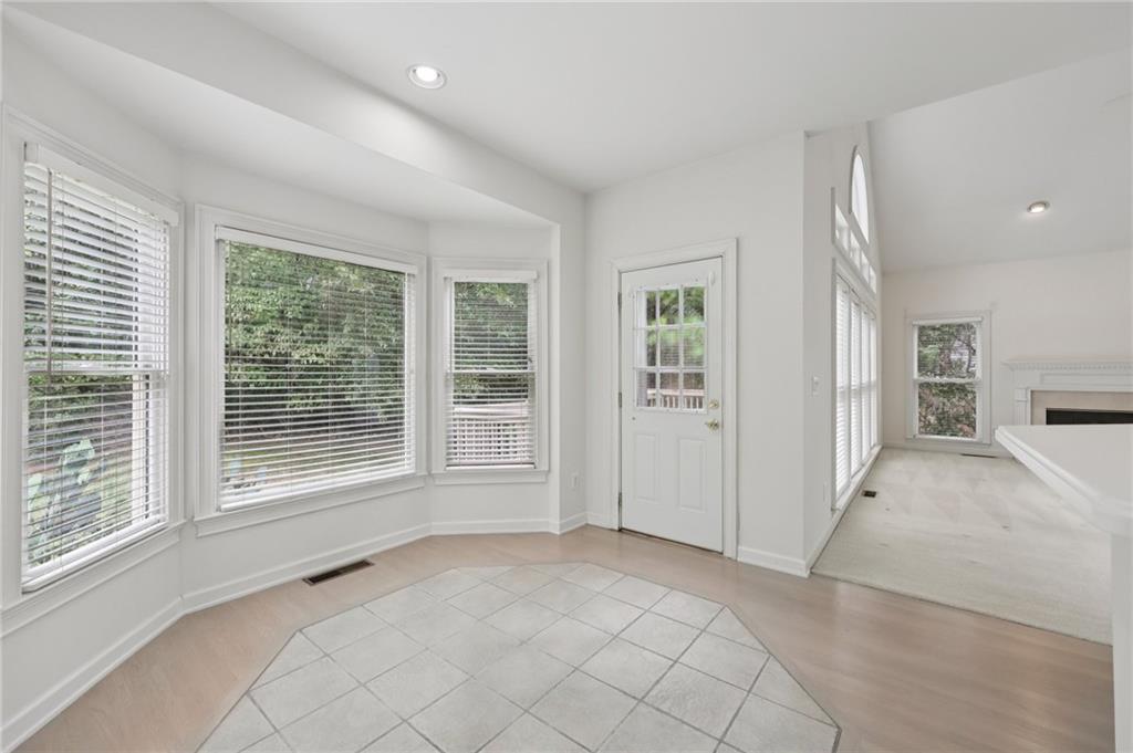 3540 Hickory Branch Trail Suwanee, GA 30024 - Photo 20 of 69 a view of an empty room with a window