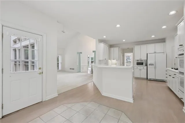 a bathroom with a sink a toilet and a bathtub