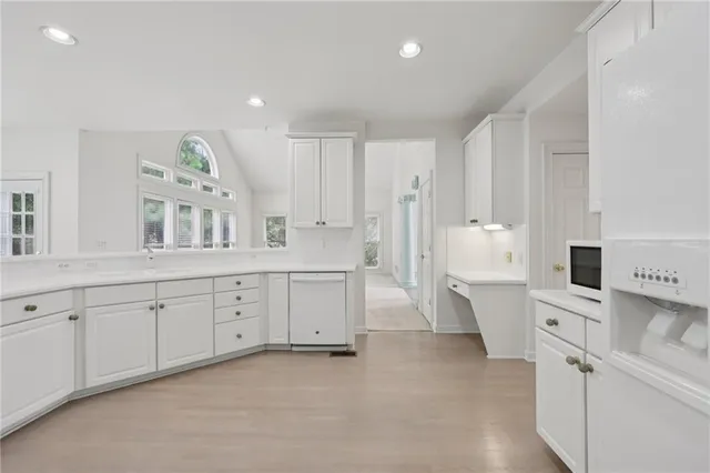 a bathroom with a double vanity sink mirror and double