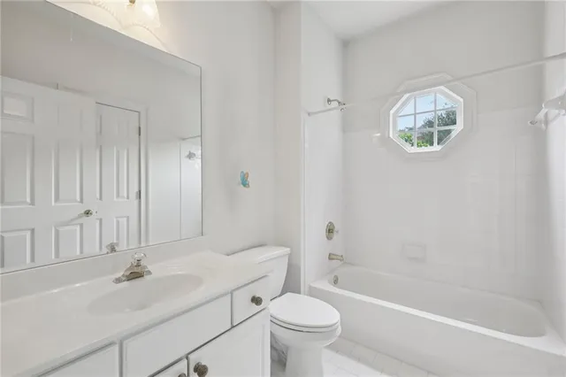a view of storage and utility room with washer and dryer