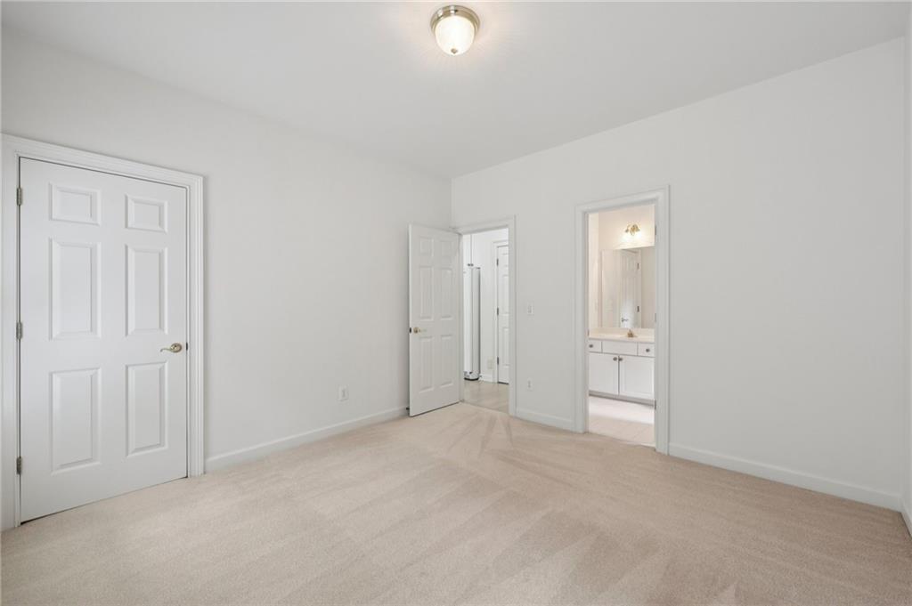 3540 Hickory Branch Trail Suwanee, GA 30024 - Photo 29 of 69 a view of an empty room and closet area