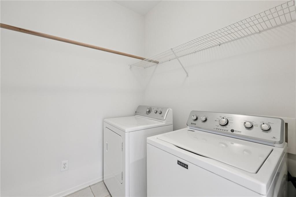 3540 Hickory Branch Trail Suwanee, GA 30024 - Photo 36 of 69 a view of storage and utility room with washer and dryer