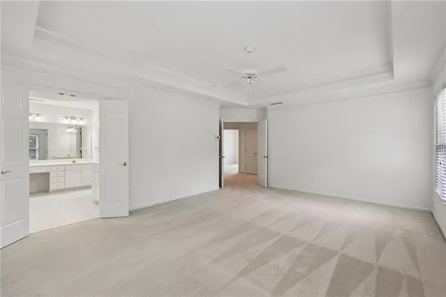 a view of balcony with wooden floor and fence