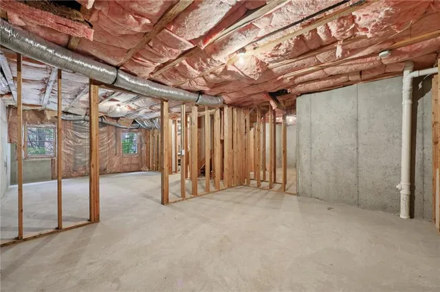 an aerial view of residential houses and outdoor space