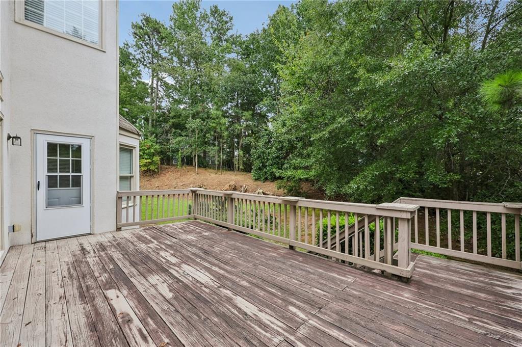 3540 Hickory Branch Trail Suwanee, GA 30024 - Photo 49 of 69 a view of balcony with deck and yard