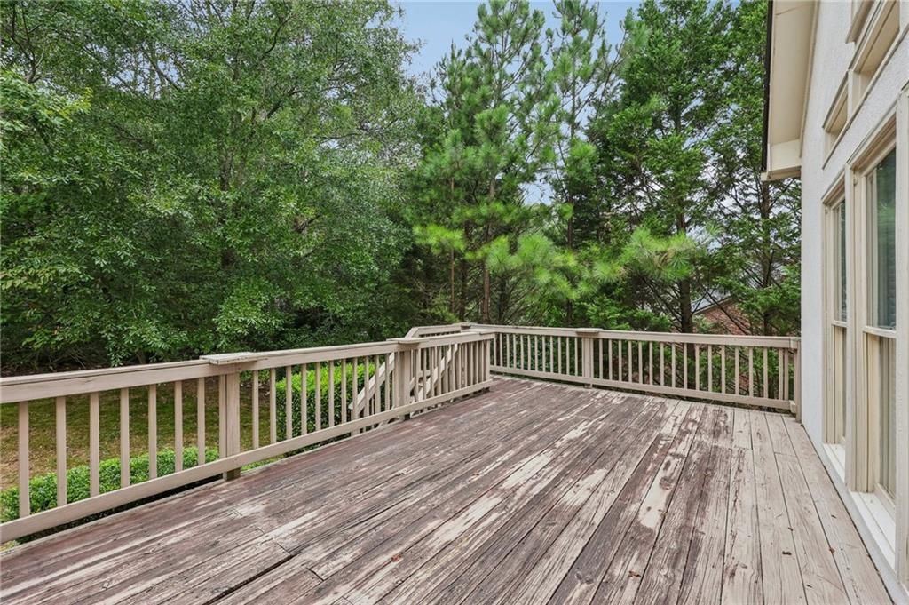 3540 Hickory Branch Trail Suwanee, GA 30024 - Photo 50 of 69 a view of balcony with wooden floor and fence
