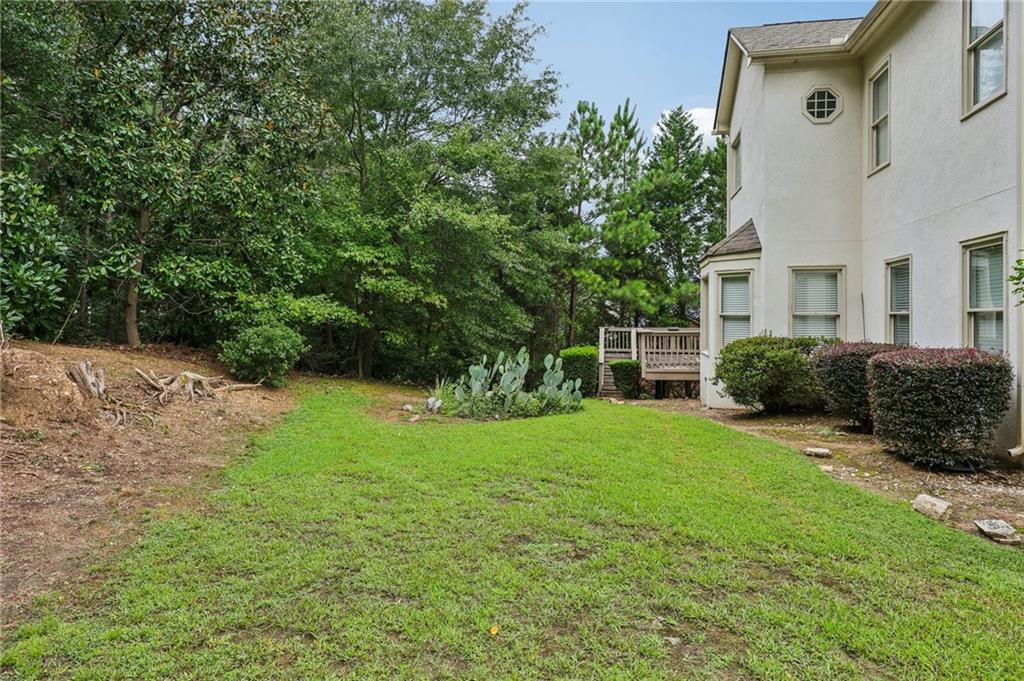3540 Hickory Branch Trail Suwanee, GA 30024 - Photo 51 of 69 a view of a house with a yard and plants