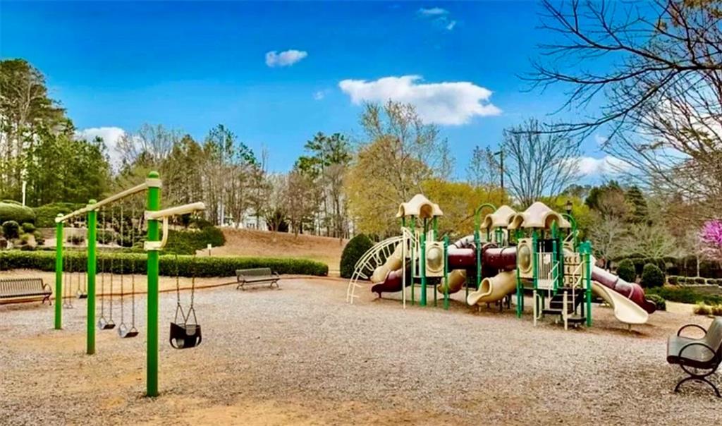 3540 Hickory Branch Trail Suwanee, GA 30024 - Photo 62 of 69 a view of a park with swings