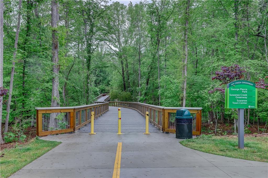 3540 Hickory Branch Trail Suwanee, GA 30024 - Photo 67 of 69 a front view of a house with a yard