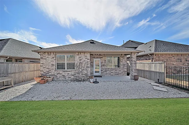 a front view of a house with patio