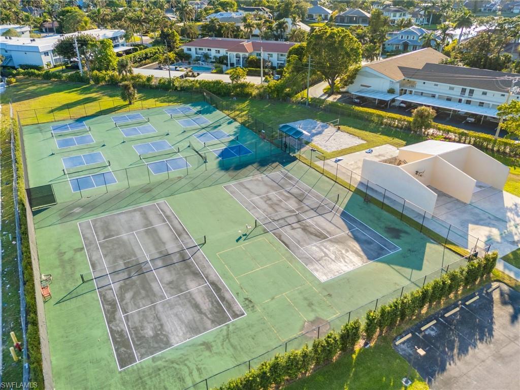 600 Neapolitan Way, Unit 257 Naples, FL 34103 - Photo 29 of 35 an aerial view of residential houses with outdoor space