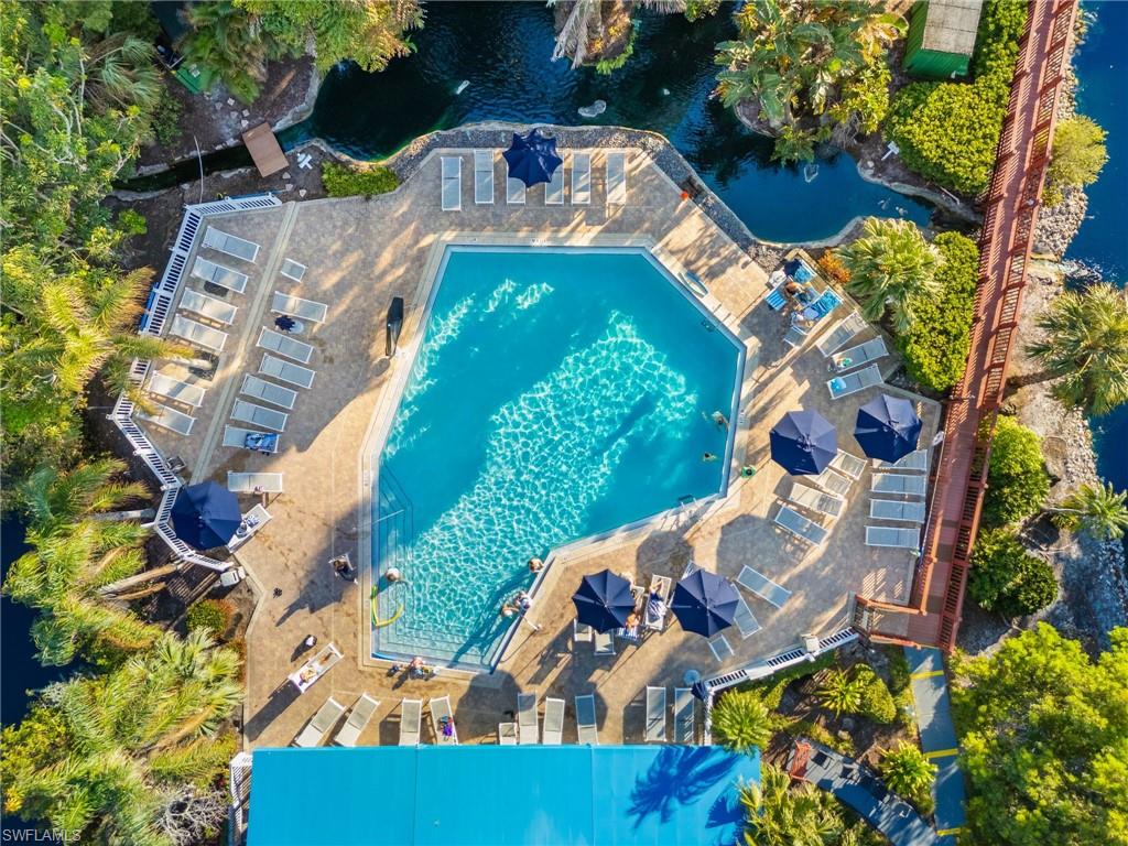 600 Neapolitan Way, Unit 257 Naples, FL 34103 - Photo 30 of 35 an aerial view of a house with a yard basket ball court