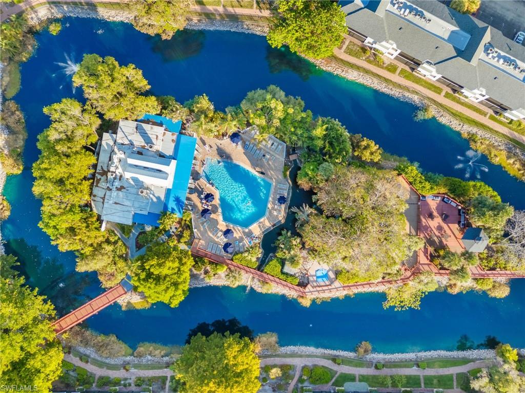 600 Neapolitan Way, Unit 257 Naples, FL 34103 - Photo 31 of 35 a view of a flower