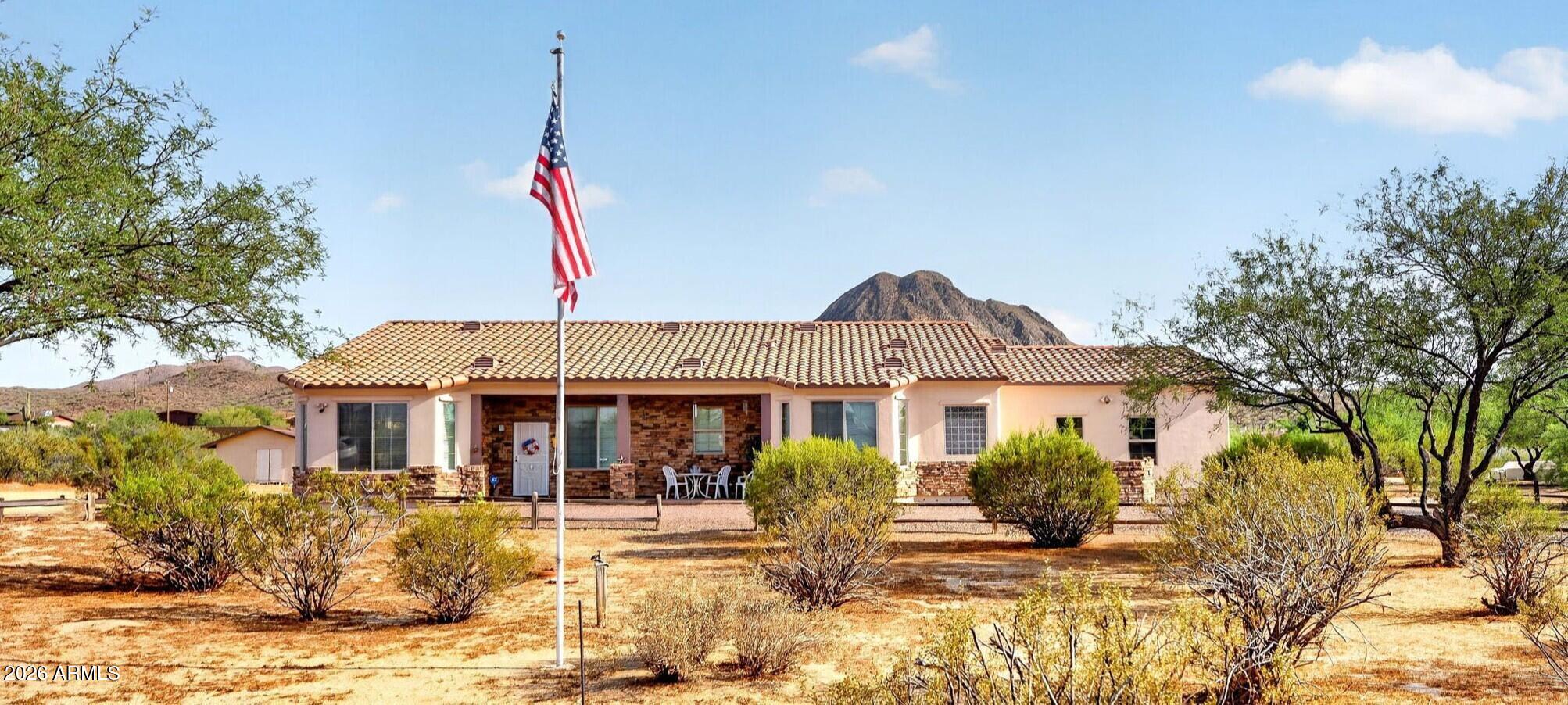 2929 West New River Road New River, AZ 85087 - Photo 50 of 53 a front view of a house with a yard