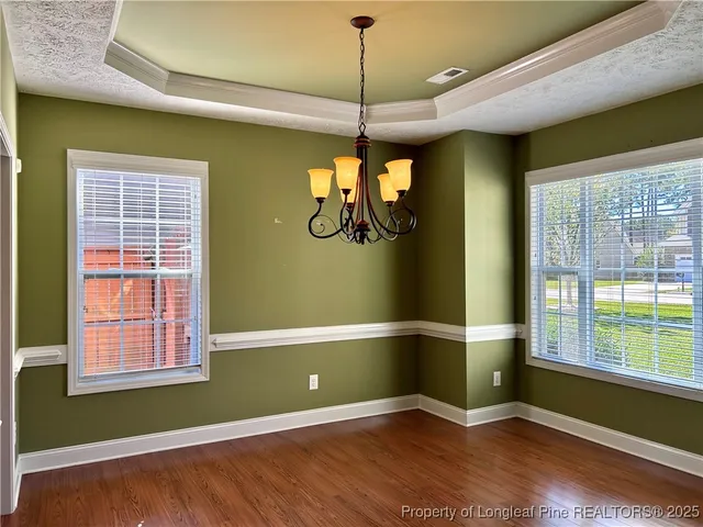 a room with window and pool