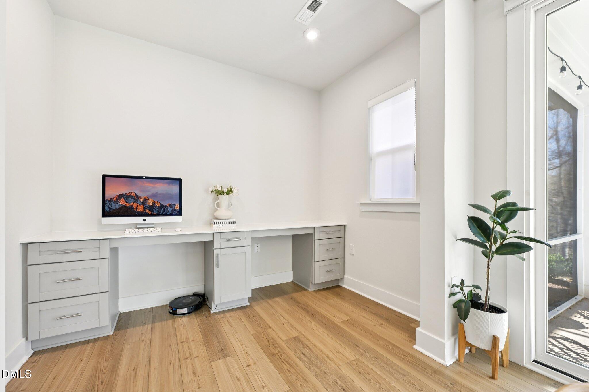 1237 Remey Avenue Wake Forest, NC 27587 - Photo 13 of 40 a workspace with furniture and window