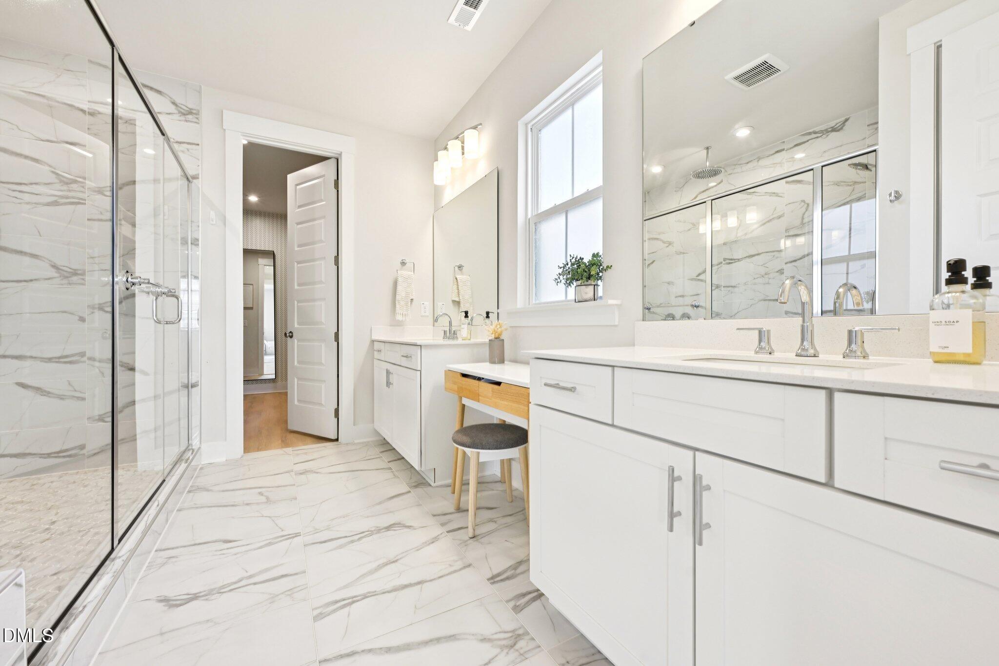 1237 Remey Avenue Wake Forest, NC 27587 - Photo 17 of 40 a large white kitchen with a sink and cabinets