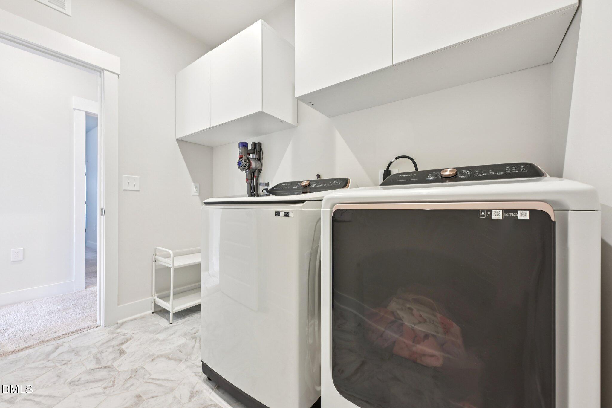 1237 Remey Avenue Wake Forest, NC 27587 - Photo 23 of 40 a utility room with dryer and washer