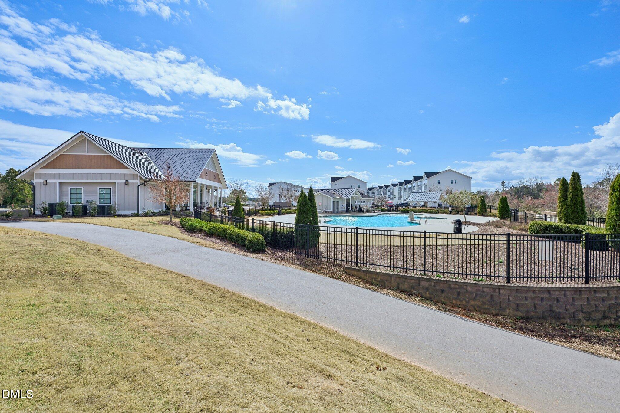 1237 Remey Avenue Wake Forest, NC 27587 - Photo 34 of 40 a view of multiple houses with a yard