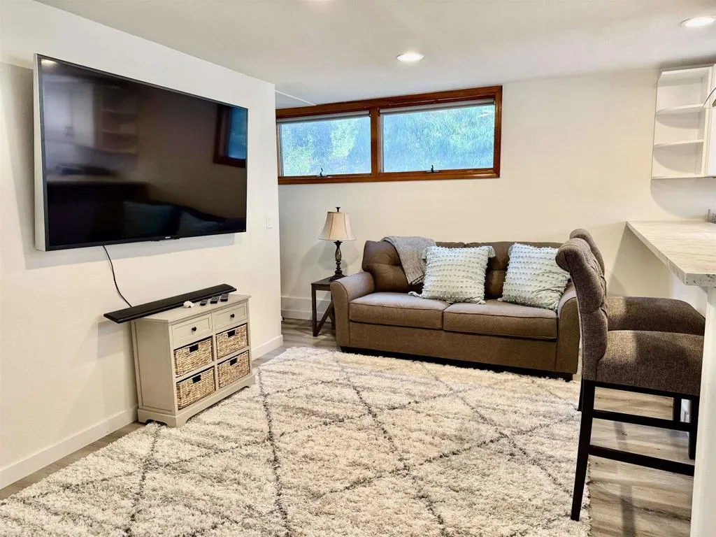 2538 Foothill Drive, Unit B Vista, CA 92084 - Photo 10 of 16 a living room with furniture and a flat screen tv