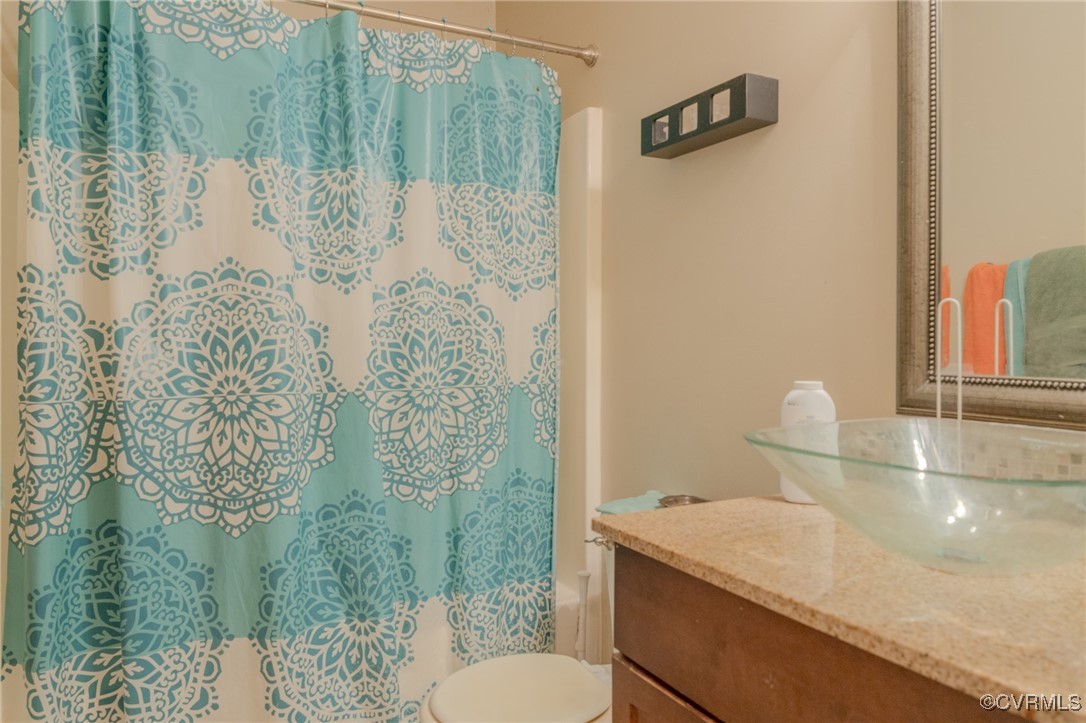 6623 Carmel Road Henrico, VA 23228 - Photo 12 of 16 Full bathroom with shower / bath combo, vanity, an