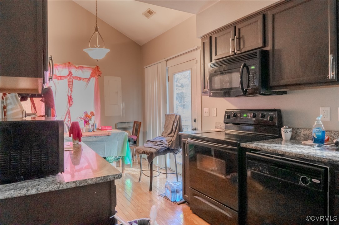 6623 Carmel Road Henrico, VA 23228 - Photo 4 of 16 Kitchen featuring lofted ceiling, hanging light fi