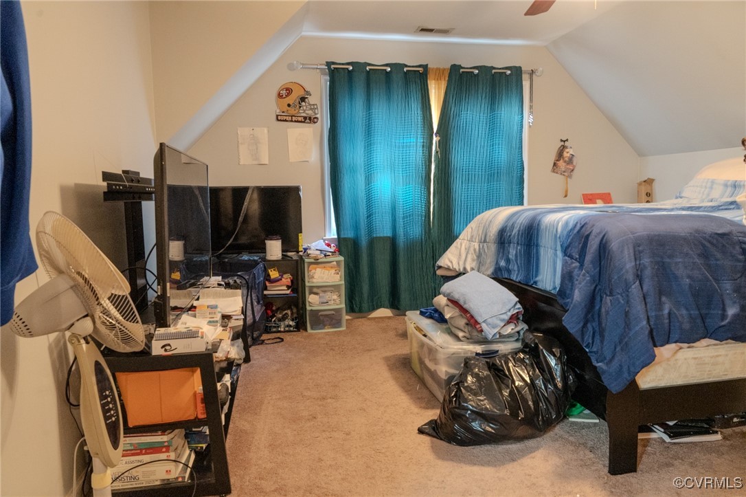 6623 Carmel Road Henrico, VA 23228 - Photo 6 of 16 Carpeted bedroom with lofted ceiling and ceiling f