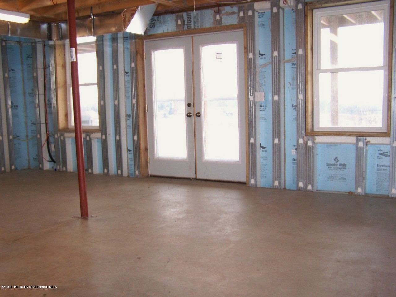 1018 Rattlesnake Hill Road Meshoppen, PA 18630 - Photo 24 of 26 an empty room with windows