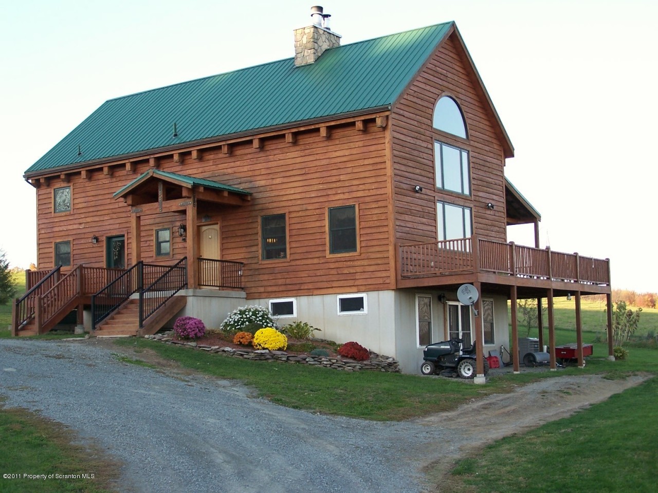 1018 Rattlesnake Hill Road Meshoppen, PA 18630 - Photo 3 of 26 a view of a house with a yard and sitting area