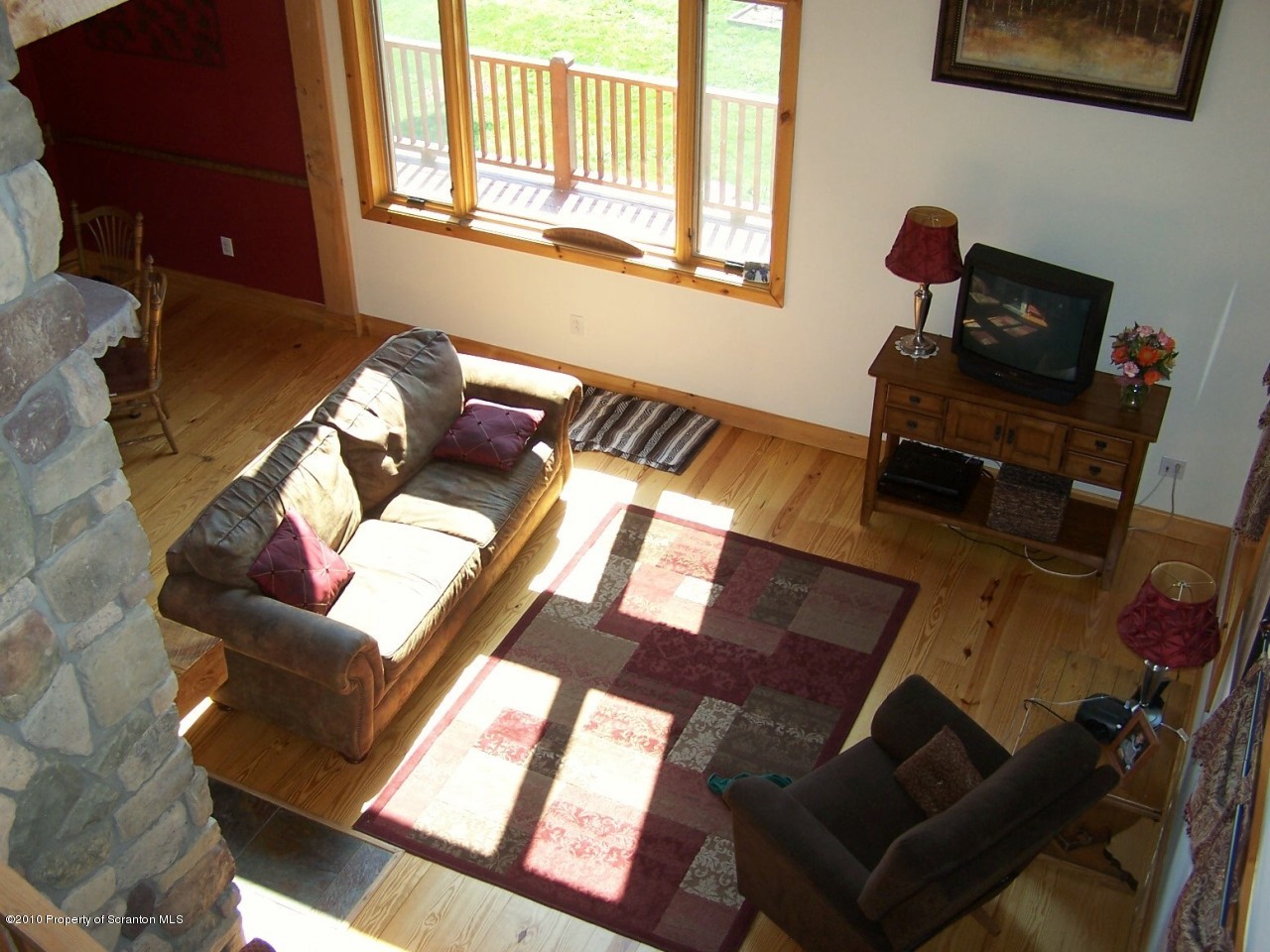 1018 Rattlesnake Hill Road Meshoppen, PA 18630 - Photo 5 of 26 a living room with furniture and a flat screen tv