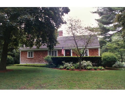 302 Red Acre Road Stow, MA 01775 - Photo 1 of 6 a front view of a house with a garden