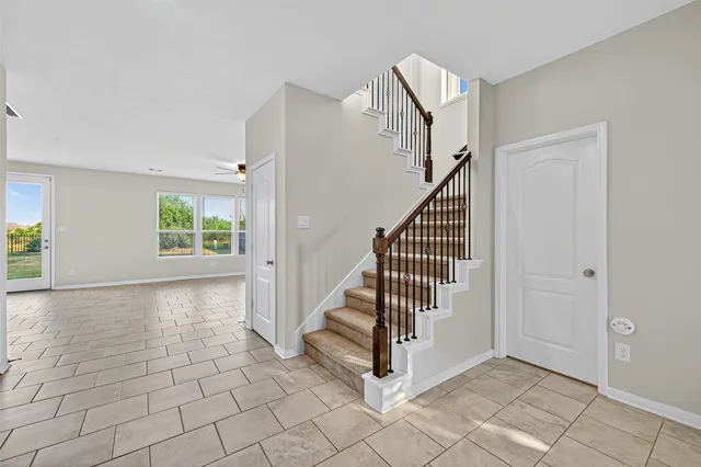 a view of an entryway with stairs