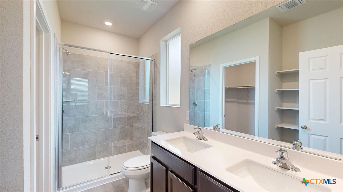 1110 Stone Vly Road Temple, TX 76502 - Photo 8 of 21 a bathroom with a sink and a mirror