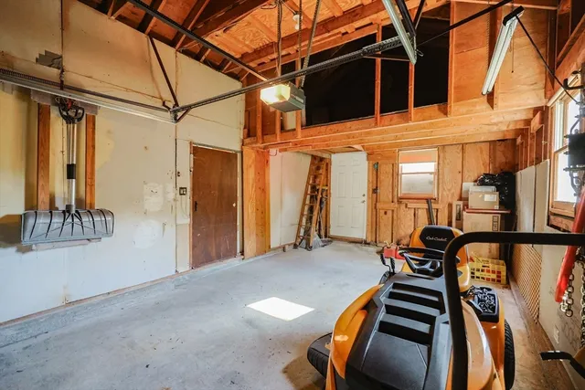 a view of a balcony with furniture