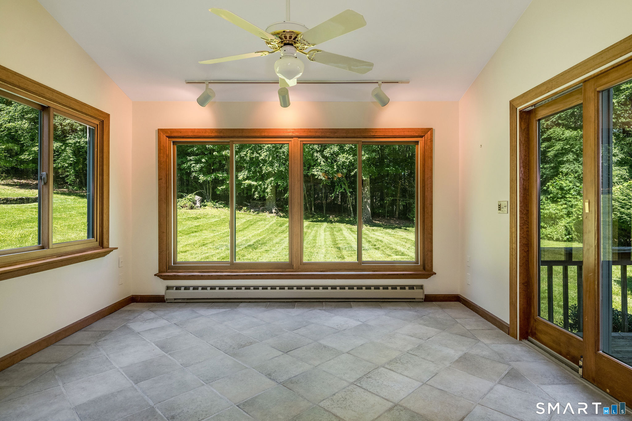 55 Sleepy Hill Road Southbury, CT 06488 - Photo 15 of 40 Sunroom. Overlooks the huge yard.