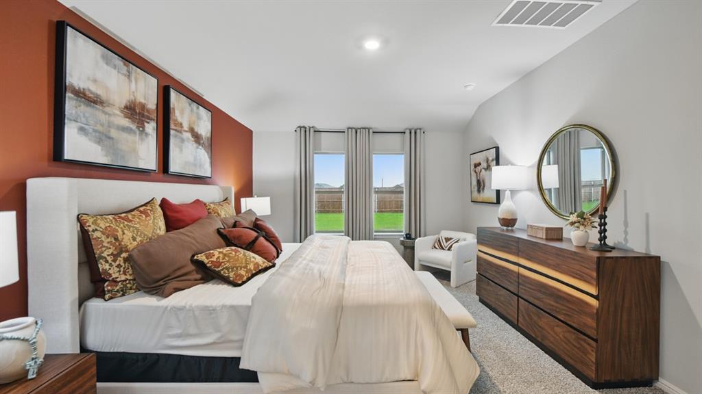 1505 Cansler Drive Krum, TX 76249 - Photo 17 of 39 a bed room with bed and a large window