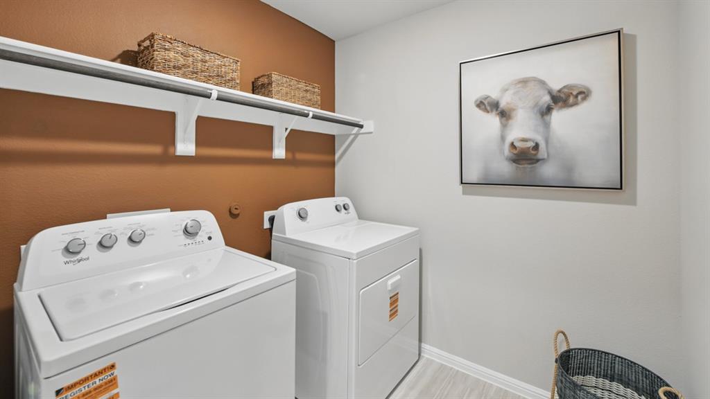 1505 Cansler Drive Krum, TX 76249 - Photo 32 of 39 a utility room with dryer and washer