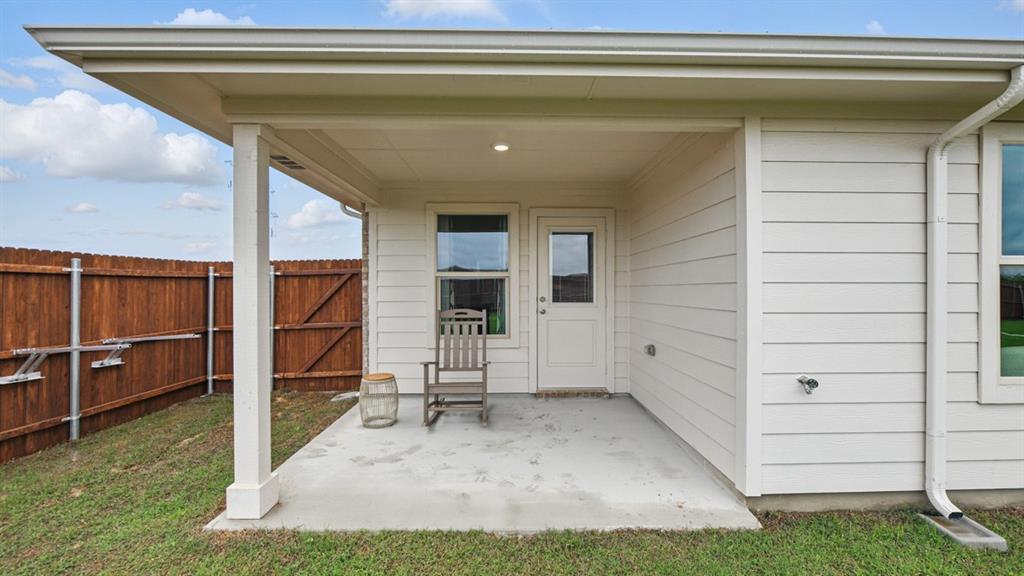 1505 Cansler Drive Krum, TX 76249 - Photo 38 of 39 a view of a house with a patio