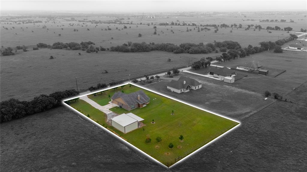 571 County Road 2830 Decatur, TX 76234 - Photo 37 of 40 an aerial view of a tennis court