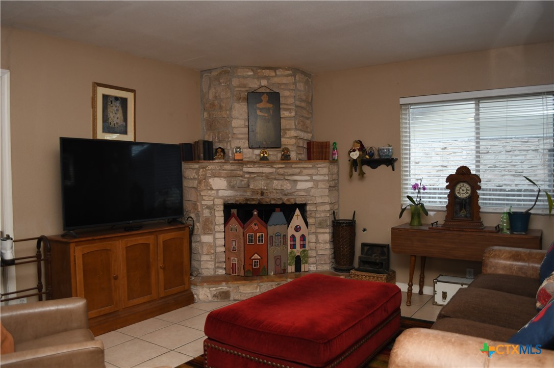 6019 Forest Ridge San Antonio, TX 78240 - Photo 2 of 25 a living room with furniture and a flat screen tv