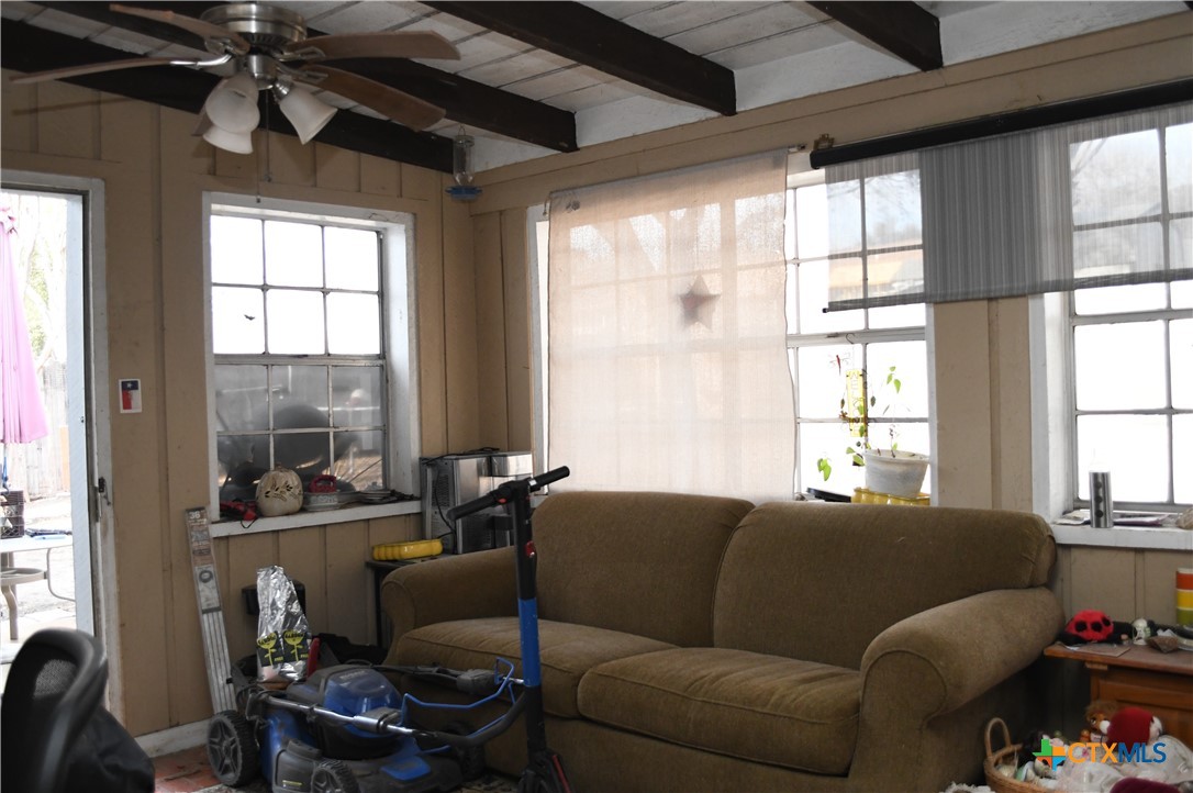 6019 Forest Ridge San Antonio, TX 78240 - Photo 21 of 25 a living room with furniture and a large window