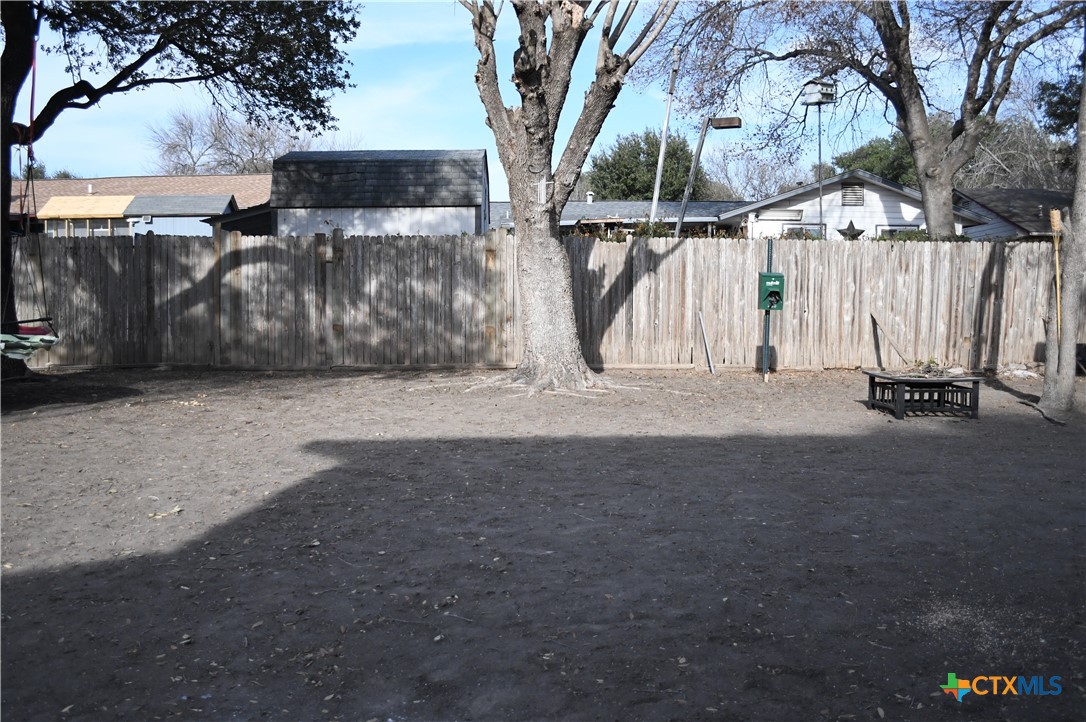 6019 Forest Ridge San Antonio, TX 78240 - Photo 22 of 25 a backyard of a house with lots of green space